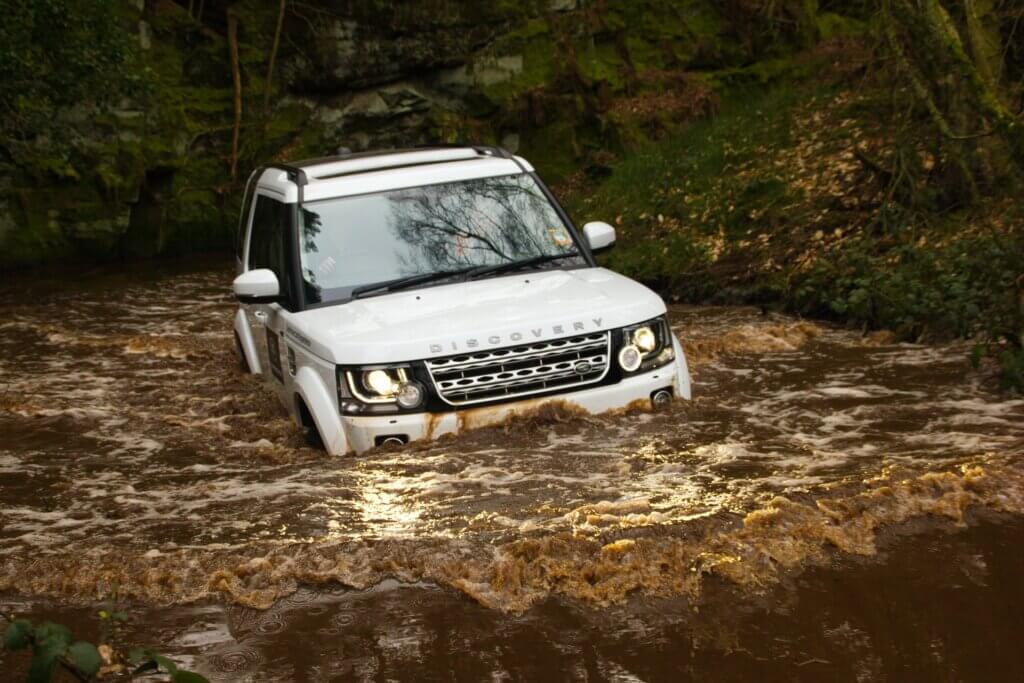 Land Rover Discovery crossing river